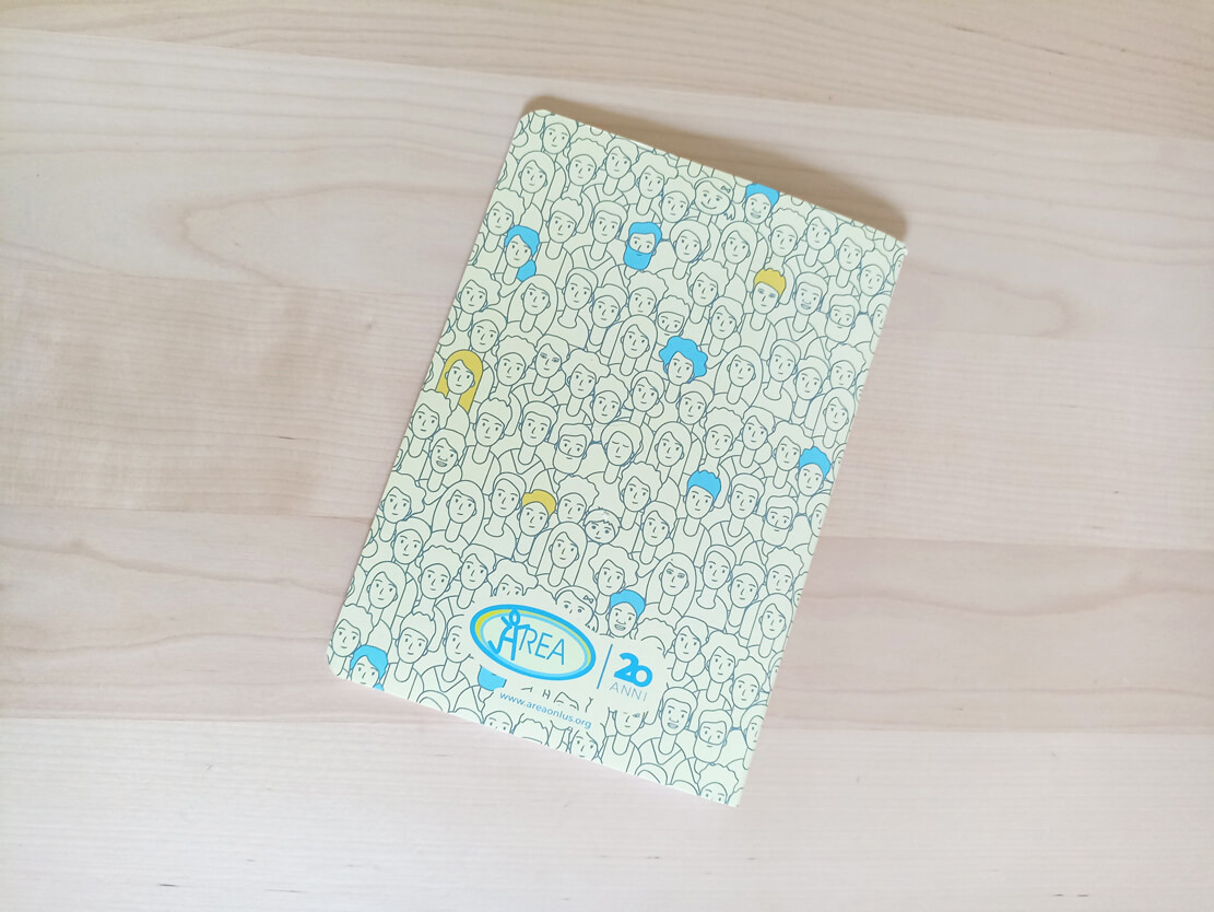 Quadernino A5 personalizzati con logo e grafica del bentennale di Cooperativa Area